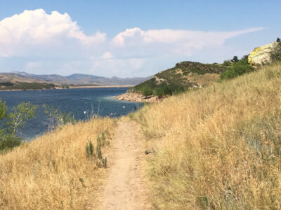 Photo of trail with Horsetooth Reservoir in Fort Collins, CO in distance